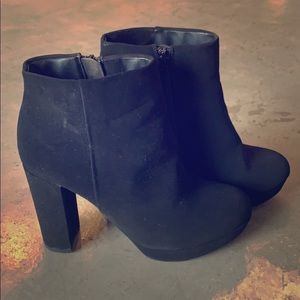 Black zip up heeled booties